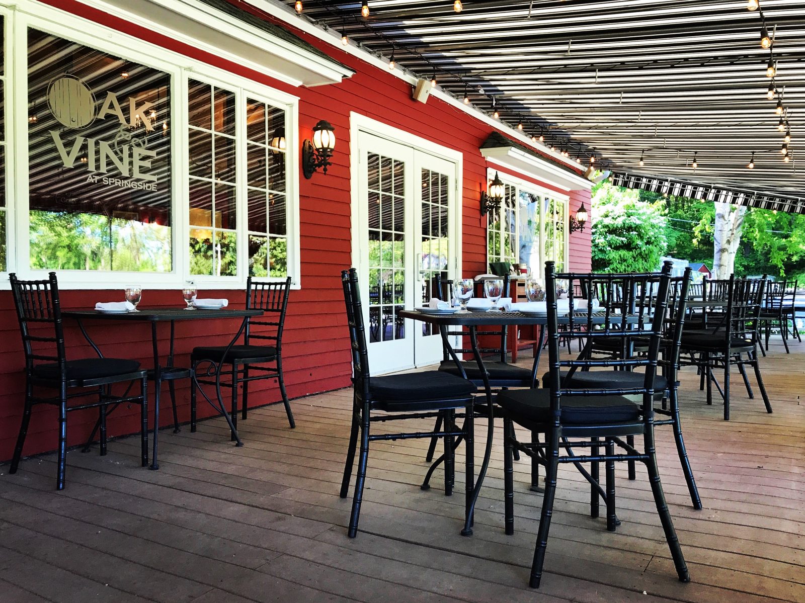 String lights line the Oak and Vine patio awning