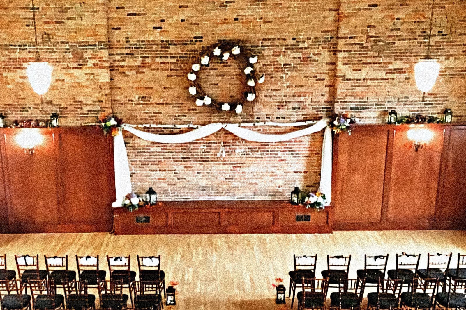 Timeless brick interior staged for a wedding ceremony